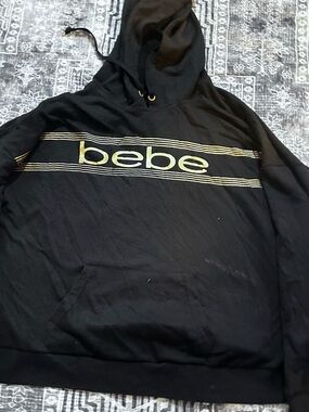bebe Black Men’s Hoodie with Gold Accents